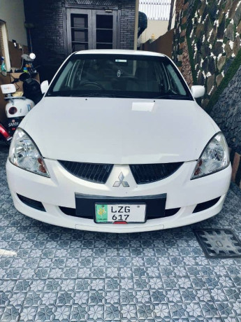 mitsubishi-lancer-2004-reg2005total-genuine-big-0