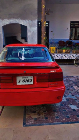 mitsubishi-lancer-1988-big-0