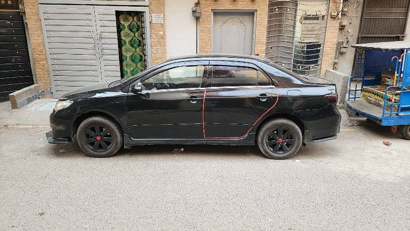 toyota-corolla-altis-2011-big-2