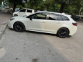 toyota-corolla-touring-hybrid-wxb-2021-small-2