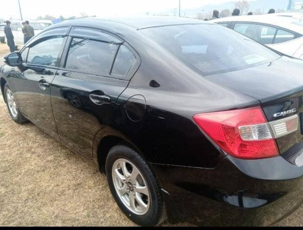 honda-civic-2015-total-geniue-big-3