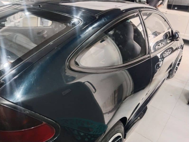 mazda-323-1995-big-5