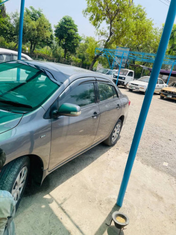 toyota-corolla-gli-vvti-13-2011-big-9