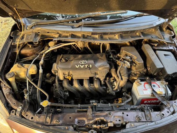 toyota-corolla-gli-2013-model-red-wine-karachi-registered-big-7