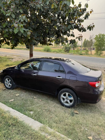 toyota-corolla-gli-2013-model-red-wine-karachi-registered-big-18