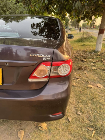 toyota-corolla-gli-2013-model-red-wine-karachi-registered-big-13