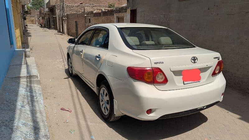 toyota-corolla-xli-2009-big-13