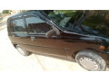 daihatsu-cuore-2006-small-0