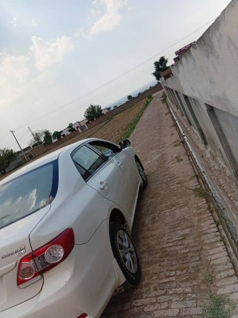 toyota-corolla-xli-2013-big-2