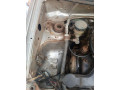daihatsu-cuore-2003-small-1