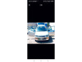 daihatsu-cuore-2006-small-1