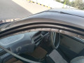 daihatsu-cuore-2008-03424826241-small-3