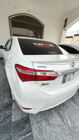 toyota-corolla-altis-grande-2015-big-1