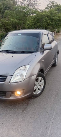 suzuki-swift-dlx-2012-total-genuine-big-3