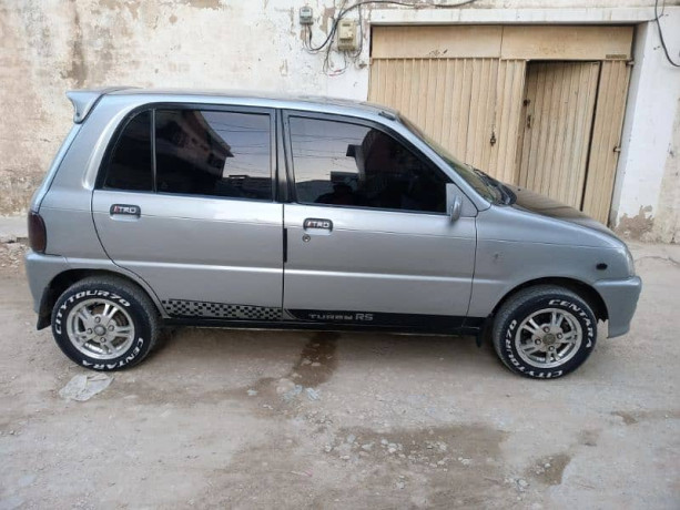 daihatsu-cuore-cx-eco-2011-big-2