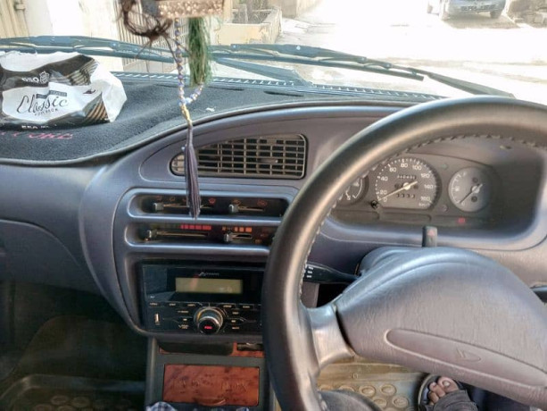 daihatsu-cuore-cx-eco-2011-big-6