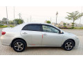 lady-doctor-driven-toyota-gli-2012-mt-new-crystal-lights-variant-small-6