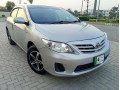 lady-doctor-driven-toyota-gli-2012-mt-new-crystal-lights-variant-small-10