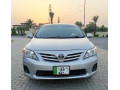lady-doctor-driven-toyota-gli-2012-mt-new-crystal-lights-variant-small-0