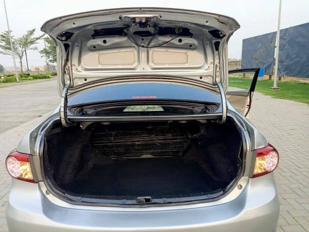 lady-doctor-driven-toyota-gli-2012-mt-new-crystal-lights-variant-big-14