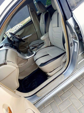 lady-doctor-driven-toyota-gli-2012-mt-new-crystal-lights-variant-big-5