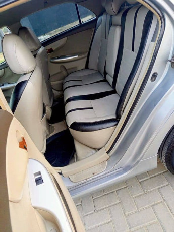 lady-doctor-driven-toyota-gli-2012-mt-new-crystal-lights-variant-big-4