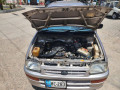 daihatsu-cuore-2004-small-0