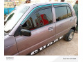 daihatsu-cuore-2004-small-0