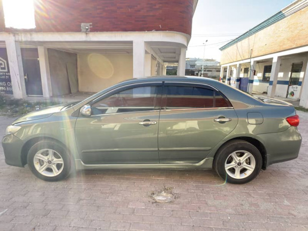 toyota-corolla-xli-vvti-2011-green-color-for-sale-in-wah-cantt-big-5