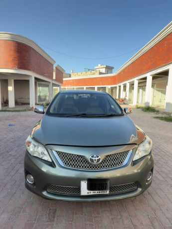 toyota-corolla-xli-vvti-2011-green-color-for-sale-in-wah-cantt-big-0