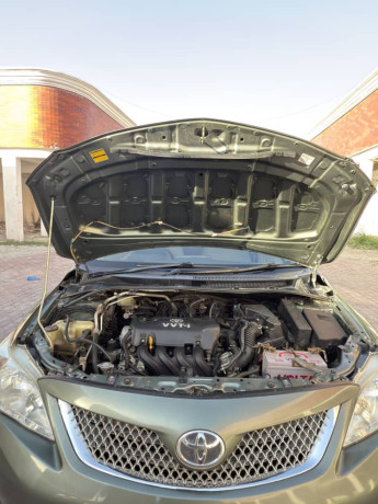 toyota-corolla-xli-vvti-2011-green-color-for-sale-in-wah-cantt-big-12