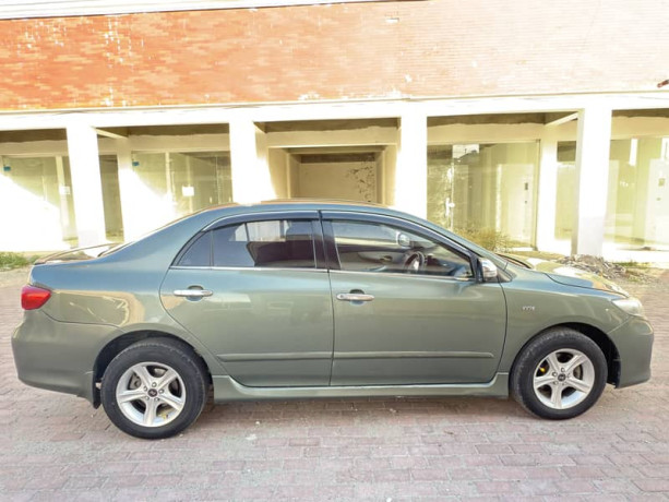 toyota-corolla-xli-vvti-2011-green-color-for-sale-in-wah-cantt-big-10