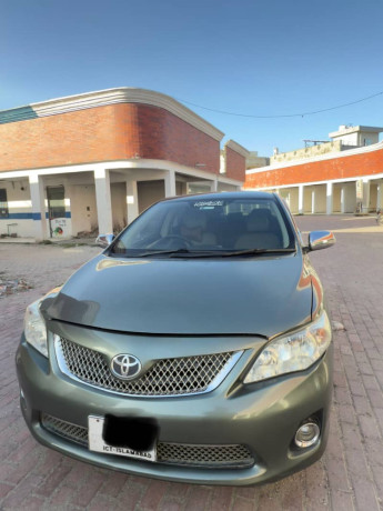 toyota-corolla-xli-vvti-2011-green-color-for-sale-in-wah-cantt-big-3
