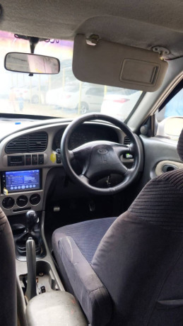 kia-spectra-2002-btr-than-baleno2odvxrcultussantrocitycivicalto-big-4