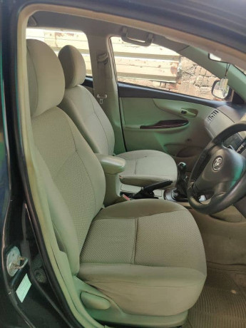 toyota-corolla-xli-2013-chat-piller-geniune-rest-spry-for-fresh-look-big-14