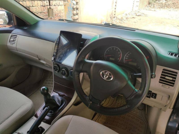 toyota-corolla-xli-2013-chat-piller-geniune-rest-spry-for-fresh-look-big-16