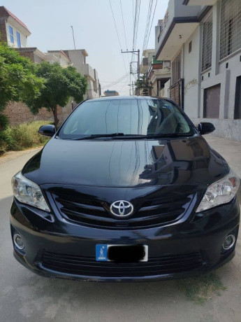 toyota-corolla-xli-2013-chat-piller-geniune-rest-spry-for-fresh-look-big-0
