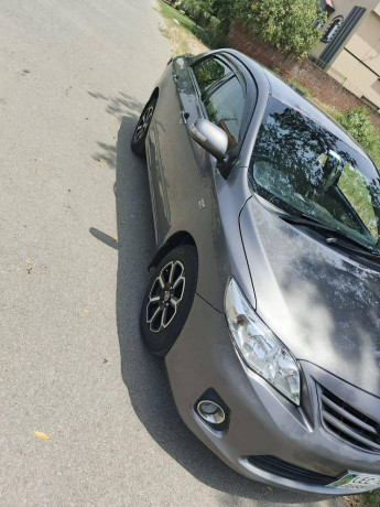 toyota-corolla-gli-2013-speical-edition-big-3