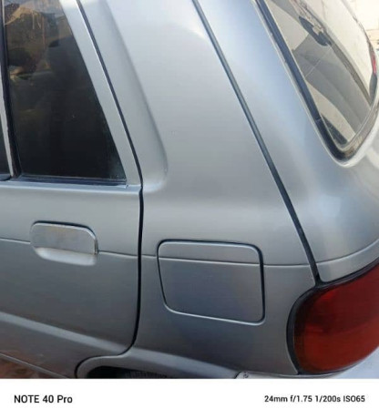 daihatsu-cuore-2003-big-11