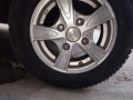daihatsu-cuore-2010-small-1