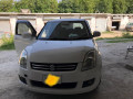 suzuki-swift-dlx-2012-small-0