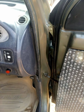 daihatsu-cuore-2002-big-11