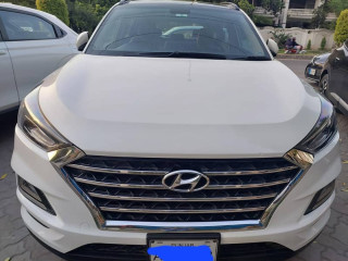 tucson-awd-total-genuine