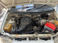daihatsu-cuore-2003-small-0