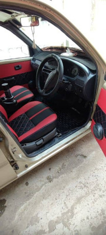 daihatsu-cuore-2011-big-4