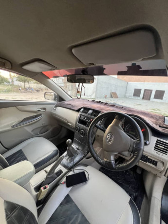 corolla-xli-converted-to-gli-facelifted-tk-2014-model-big-10