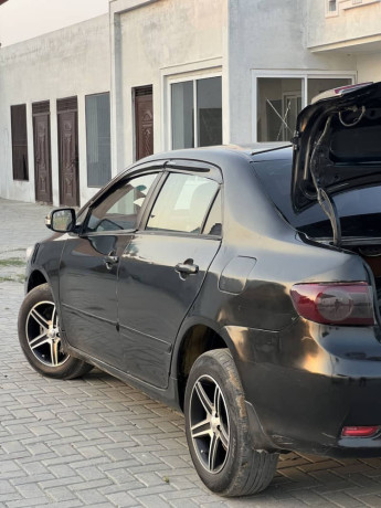 corolla-xli-converted-to-gli-facelifted-tk-2014-model-big-2