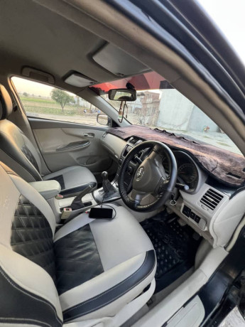 corolla-xli-converted-to-gli-facelifted-tk-2014-model-big-7