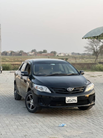 corolla-xli-converted-to-gli-facelifted-tk-2014-model-big-0