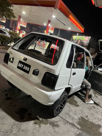 mehran-2003-model-white-color-biometric-available-big-1